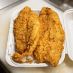 Fried Fish (2) over rice with bread